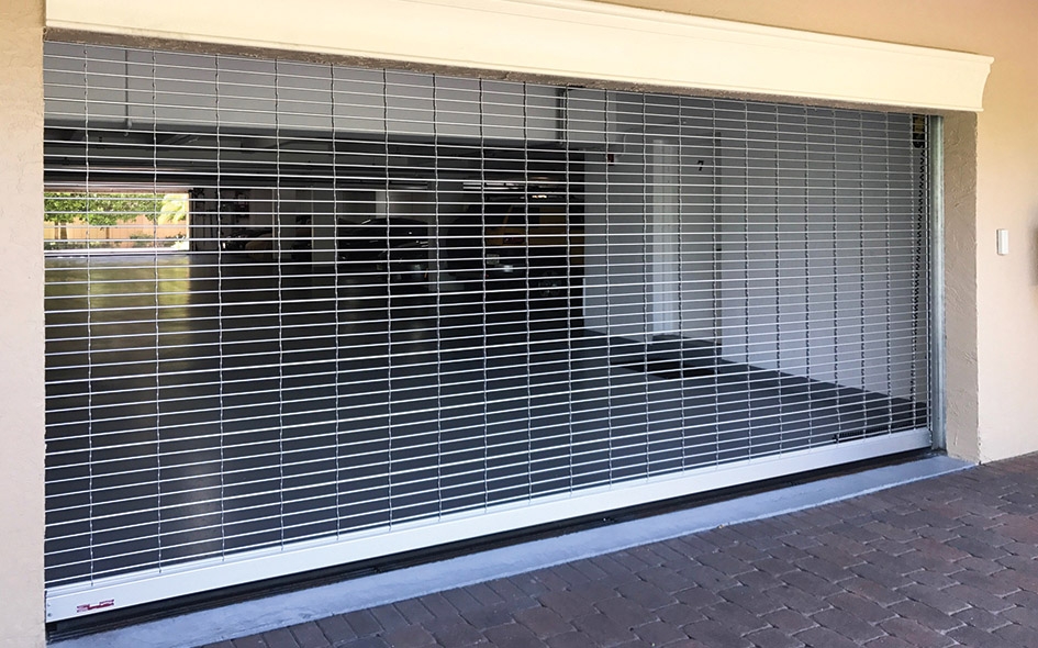 Security grille protecting a commercial entrance